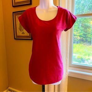 NWOT Tuff Athletics fuchsia yoga top with keyhole detail back. Size Small